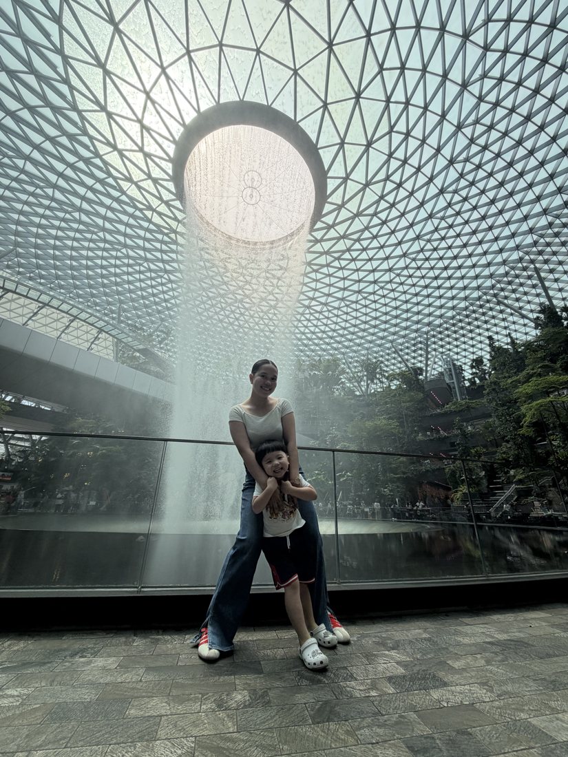 Helper with child at Jewel Changi