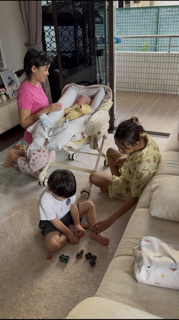 Helpers caring for an infant and toddler at home
